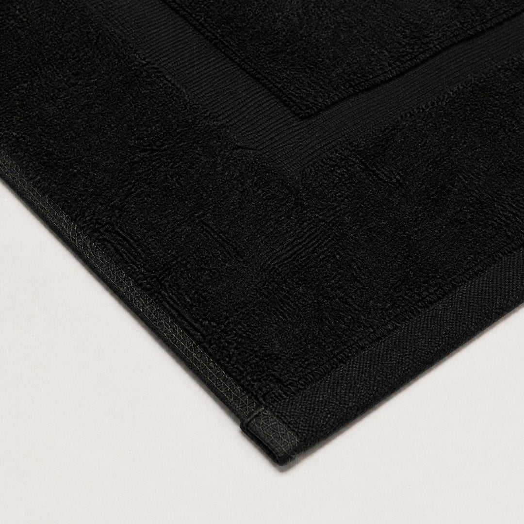 Cotton Bath Mat corner close-up (Midnight Black)