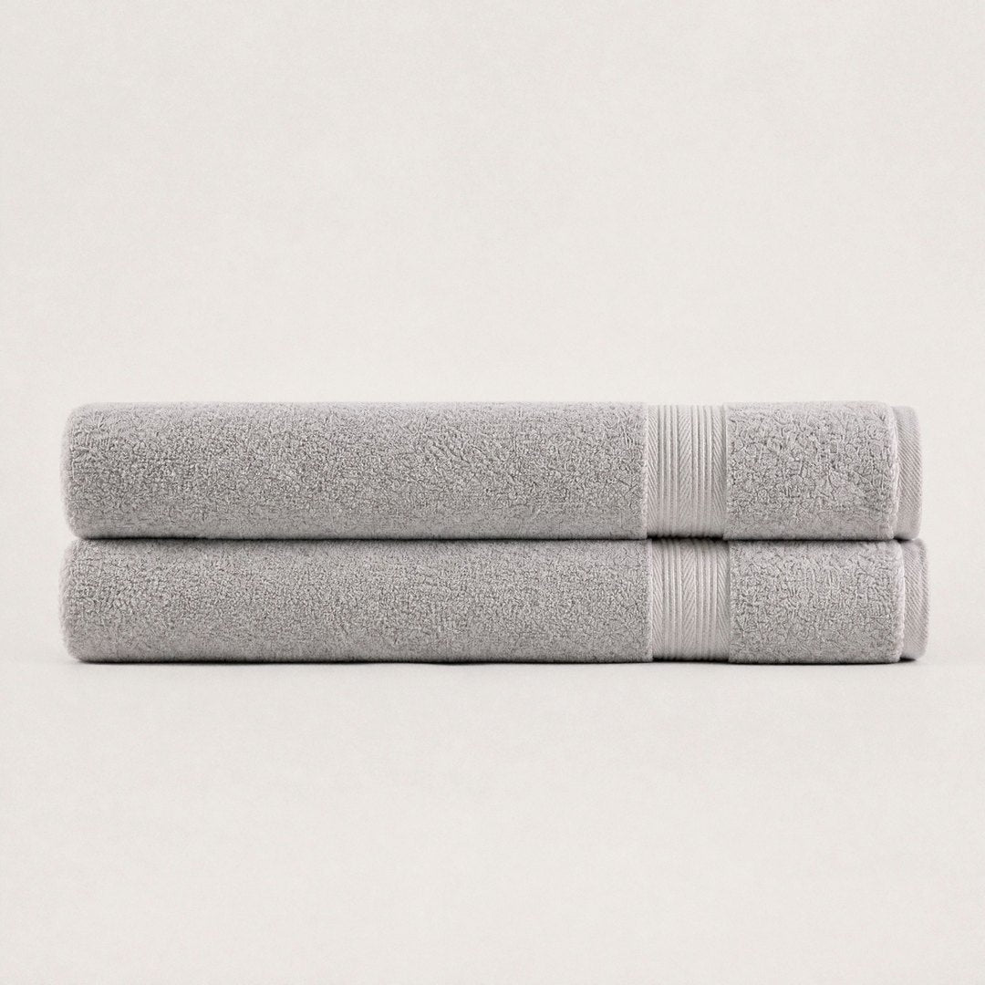 Two folded Ultrasoft bath sheets (Stone Grey)