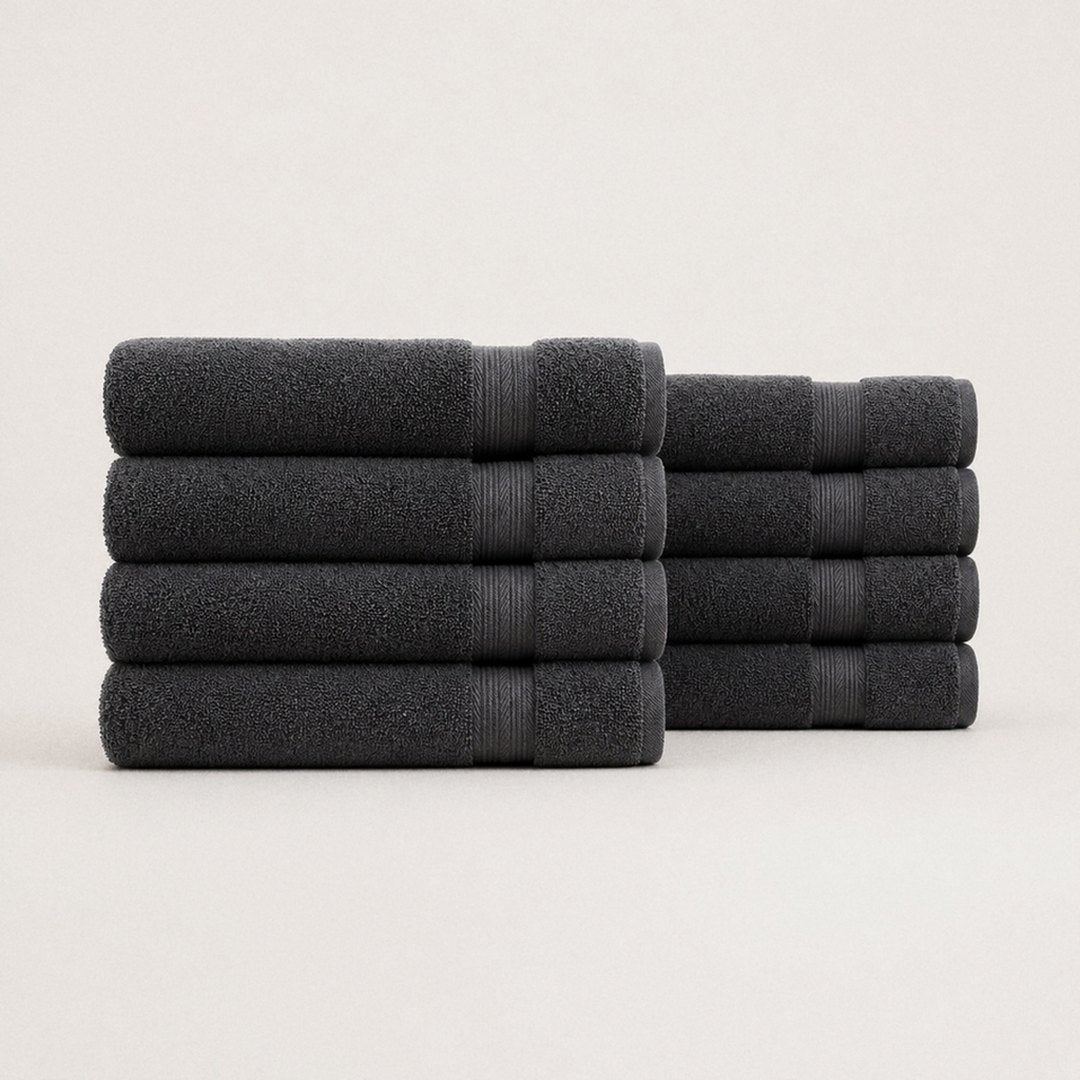 Eight folded Ultrasoft bath towels (Charcoal)