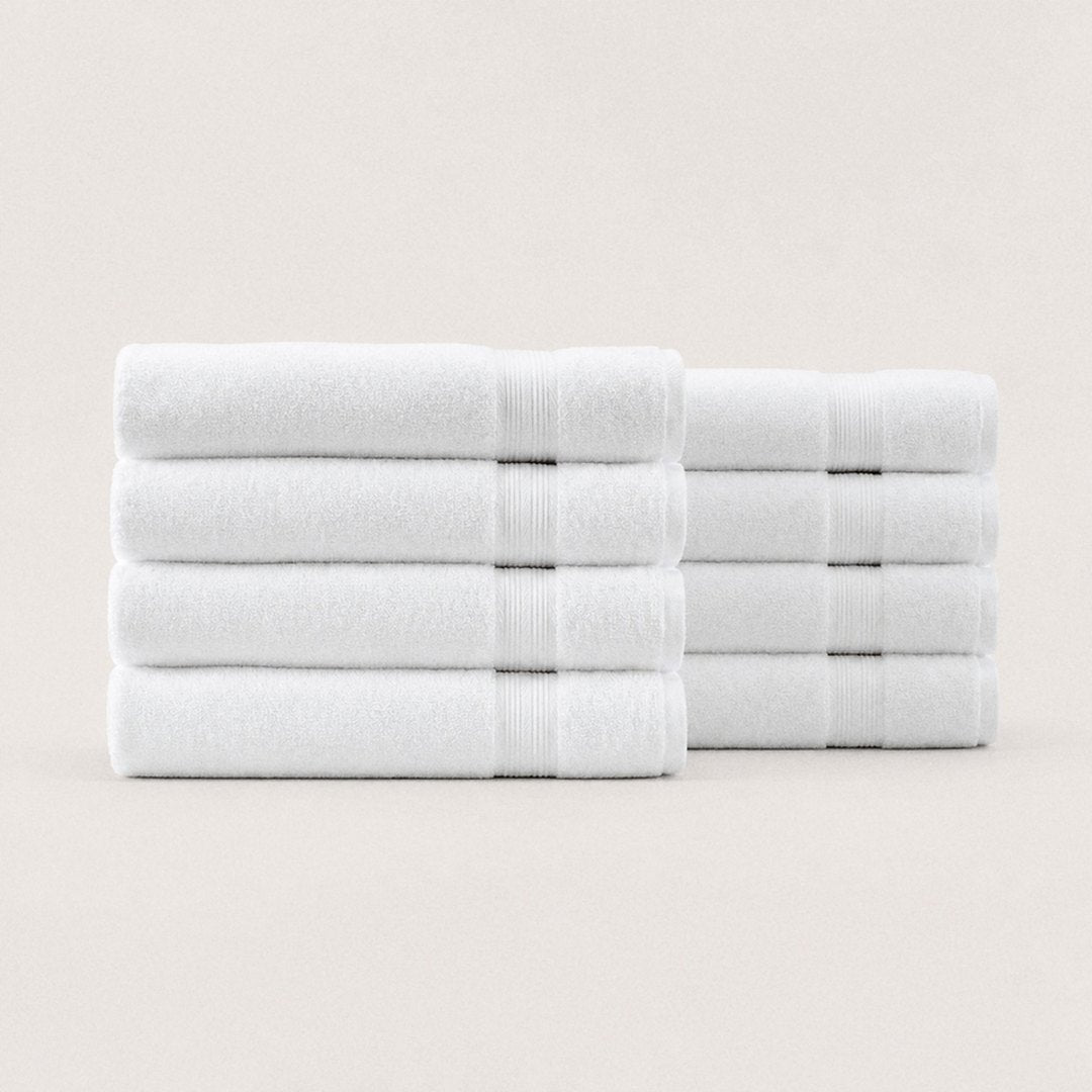 Eight folded Ultrasoft bath towels (Cloud White)