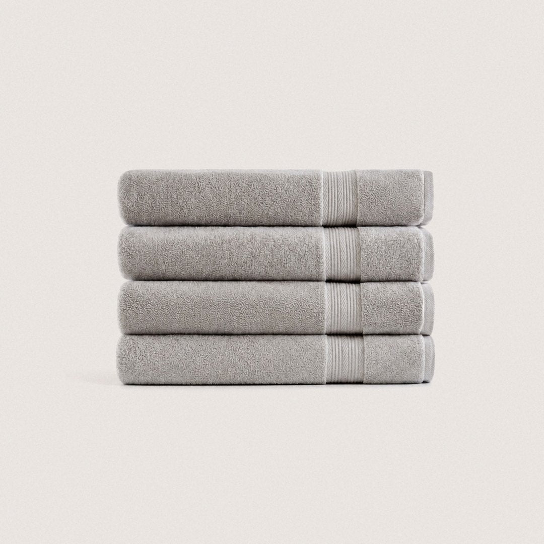 Four folded Ultrasoft bath towels (Stone Grey)