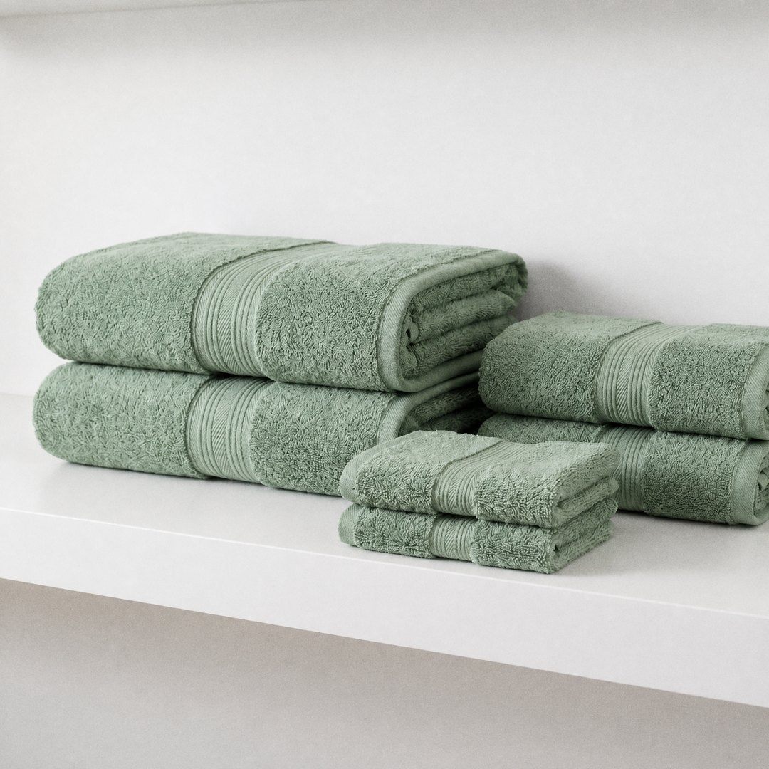 Towel set on a white shelf (Sage)