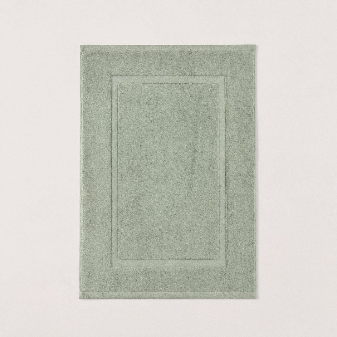 Cotton bath mat laid flat (Sage)
