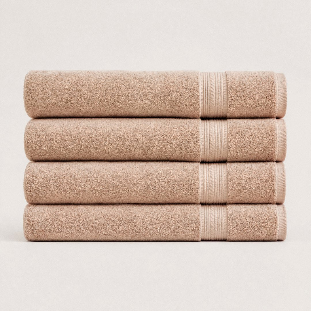 Four folded Ultrasoft bath sheets (Sand)