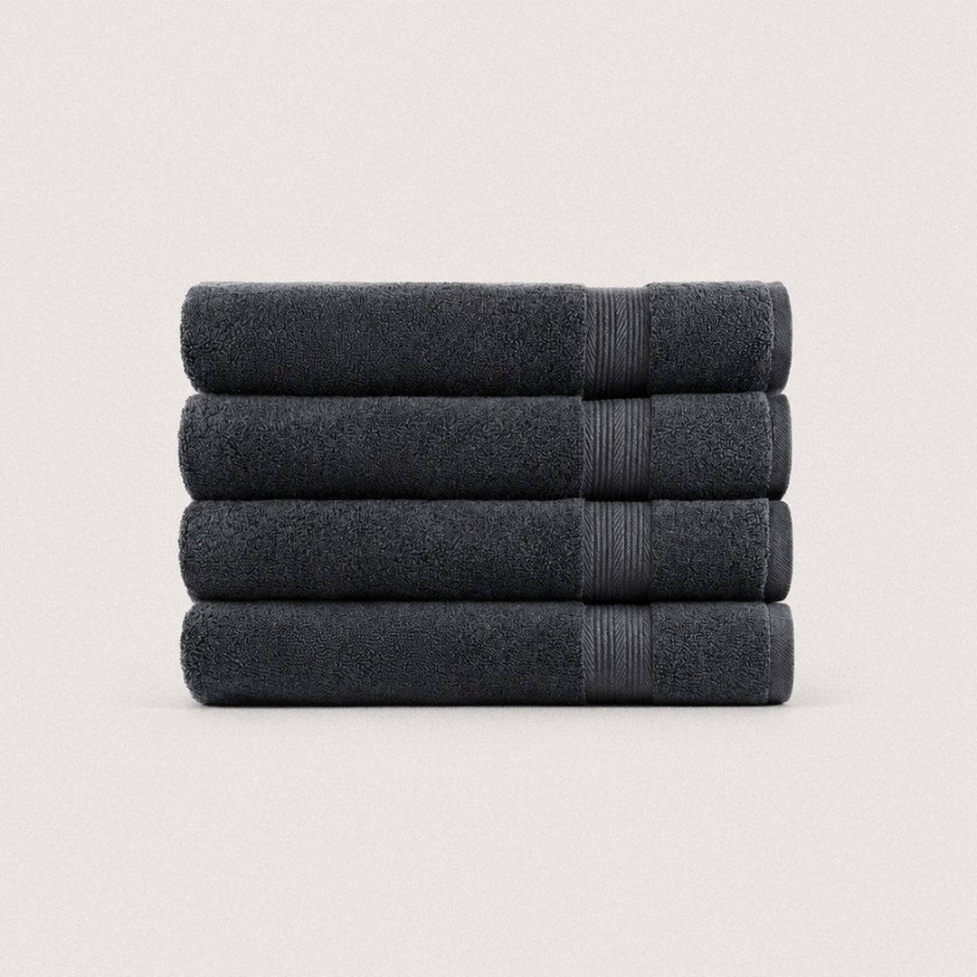 Four folded Ultrasoft bath towels (Charcoal)