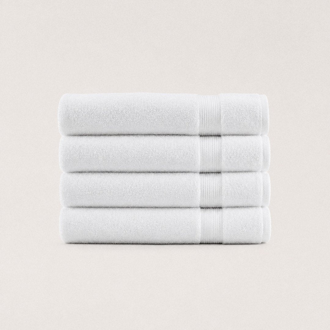Four folded Ultrasoft bath towels (Cloud White)