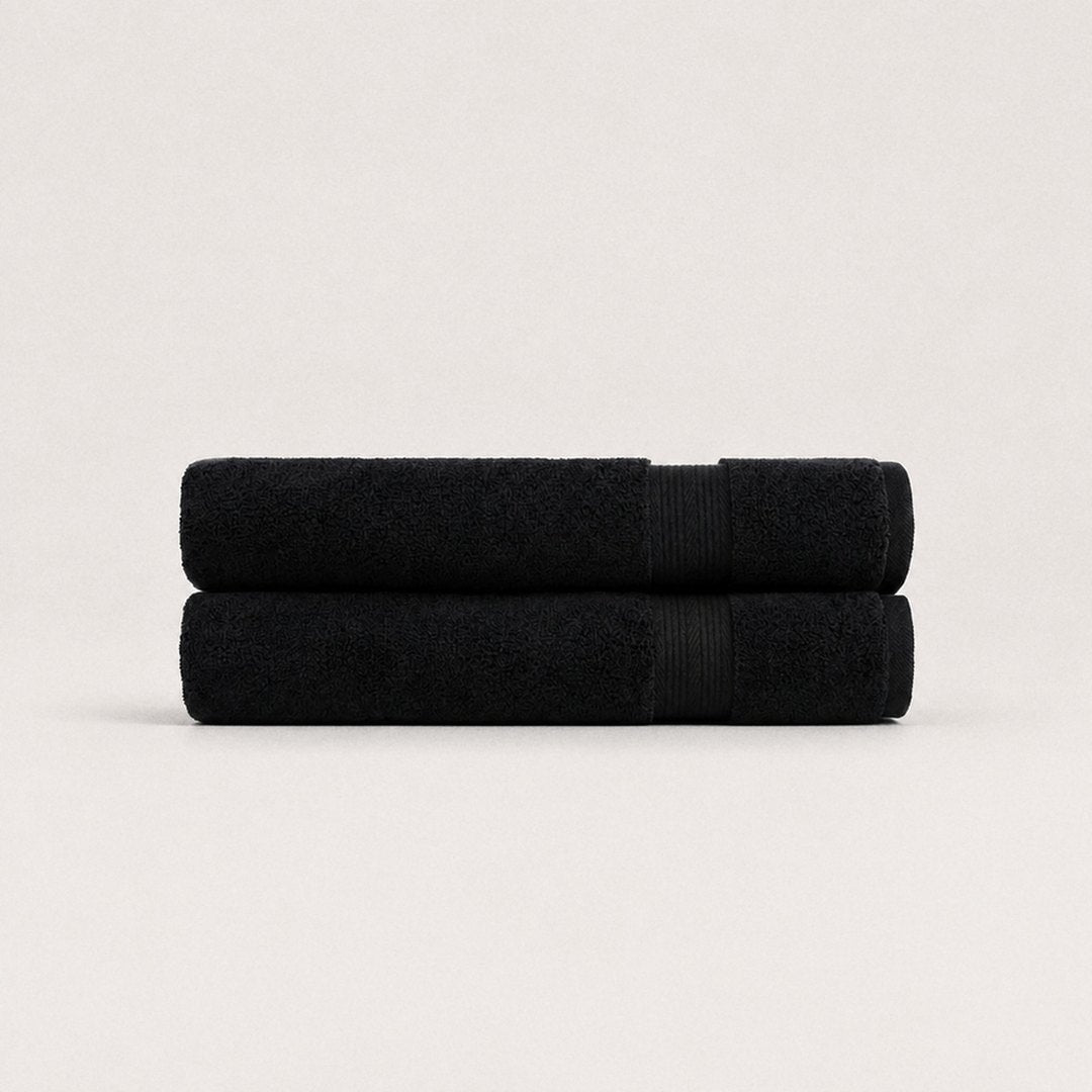 Two folded Ultrasoft bath towels (Midnight Black)