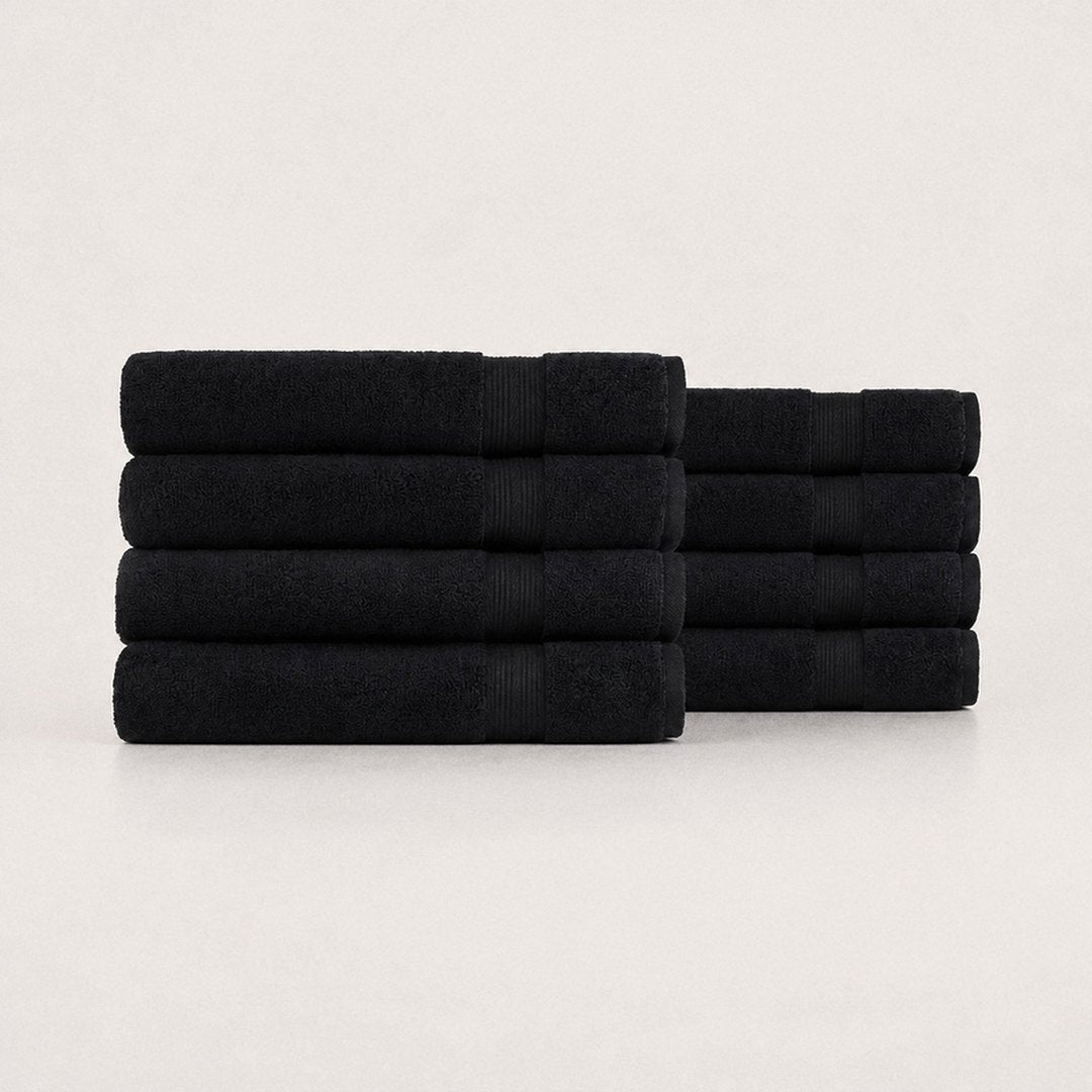 Eight folded Ultrasoft bath towels (Midnight Black)