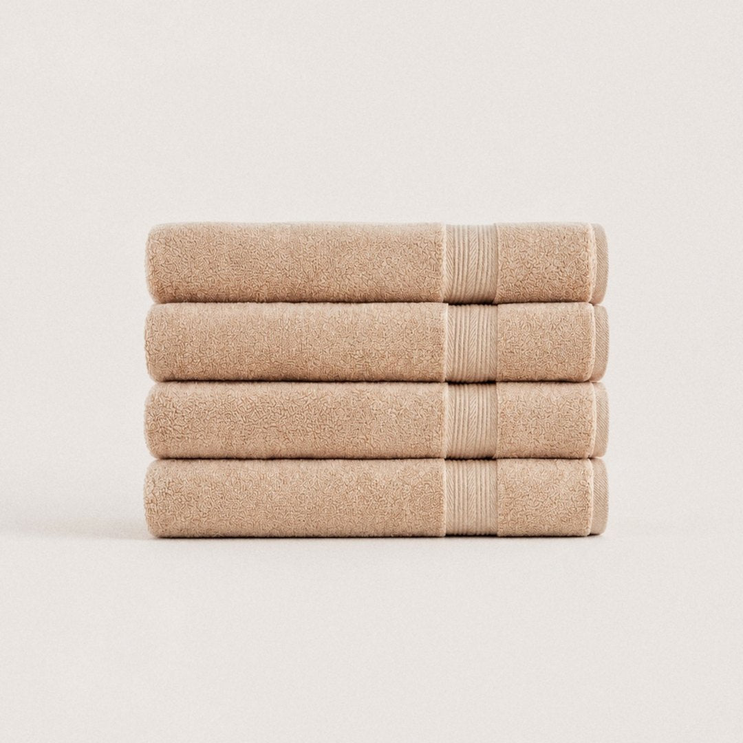 Four folded Ultrasoft bath towels (Sand)