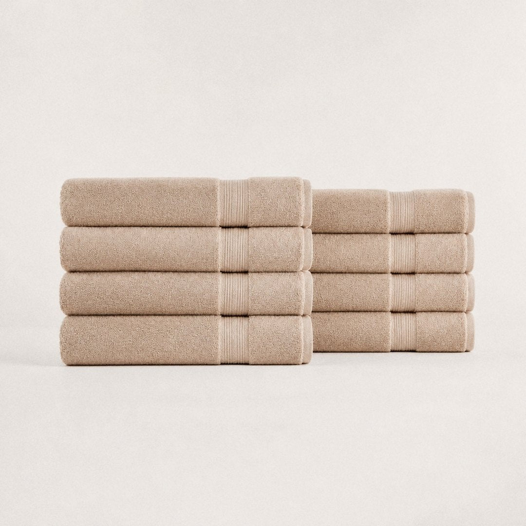 Eight folded Ultrasoft bath towels (Sand)