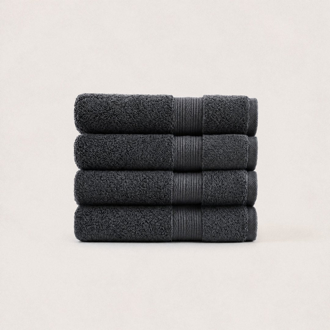 Four folded Ultrasoft hand towels (Charcoal)