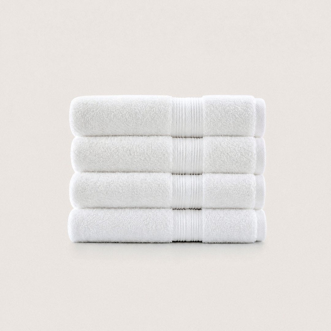Four folded Ultrasoft hand towels (Cloud White)