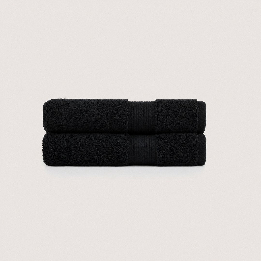 Two folded Ultrasoft hand towels (Midnight Black)