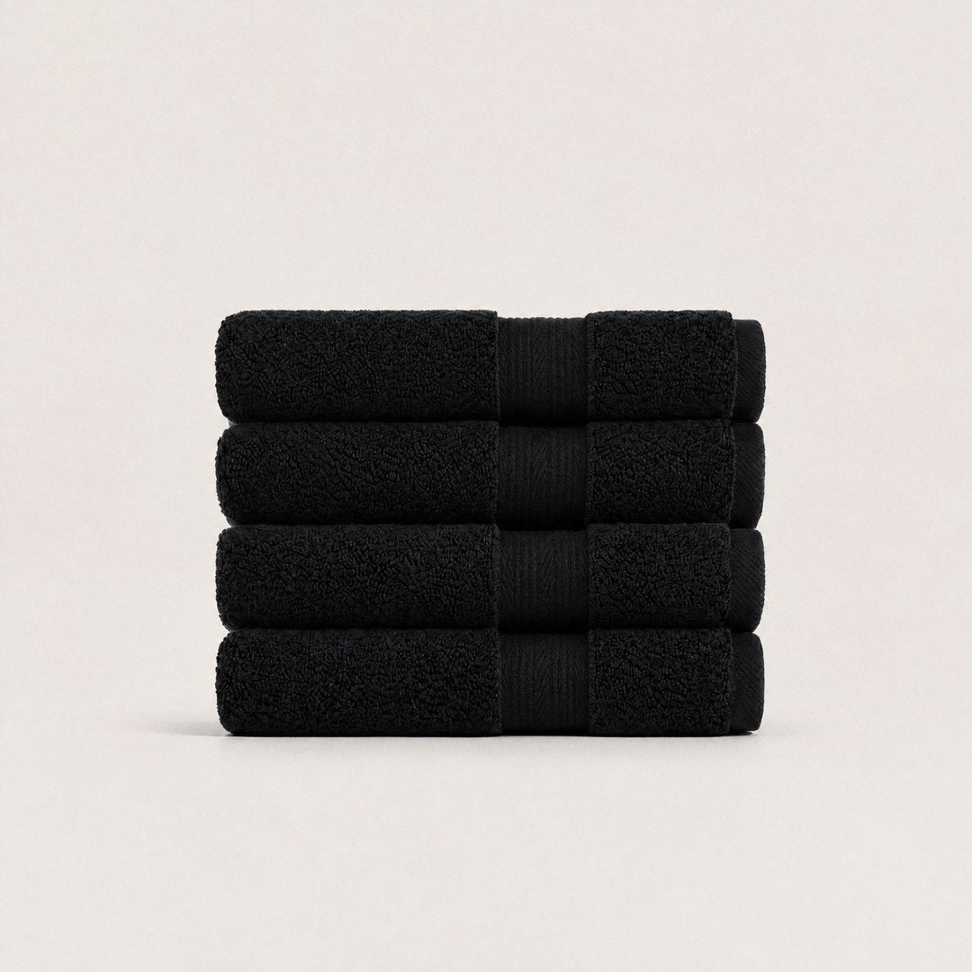 Four folded Ultrasoft hand towels (Midnight Black)